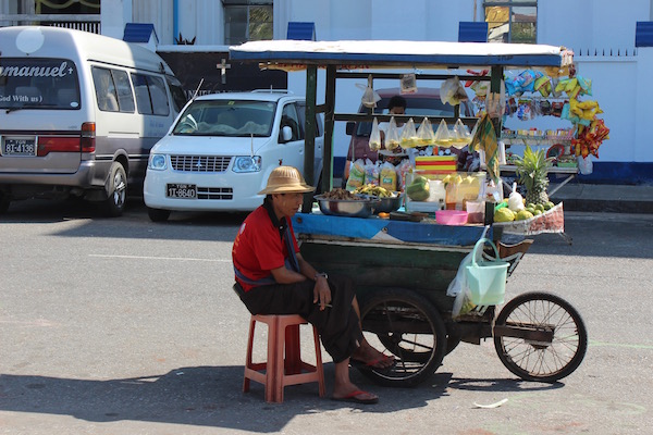 bored street cart seller Yangon