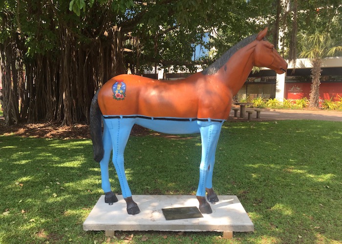 Sculpture of a horse wearing jeans