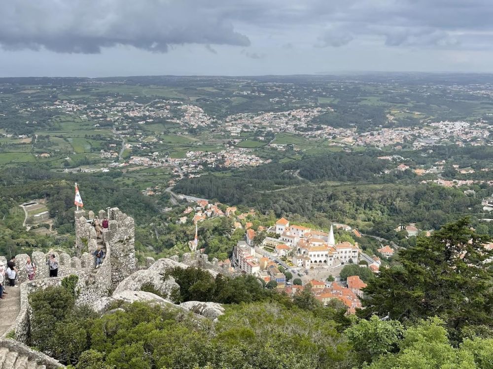 Sweeping views of the National Palace of Sintra and its surrounds as seen from above from the Moorish Castle.