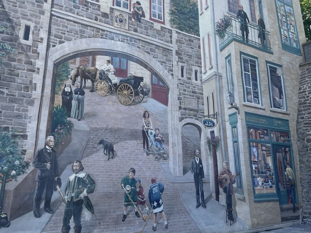 A large trompe l'oeil mural showing the old town of Quebec City 